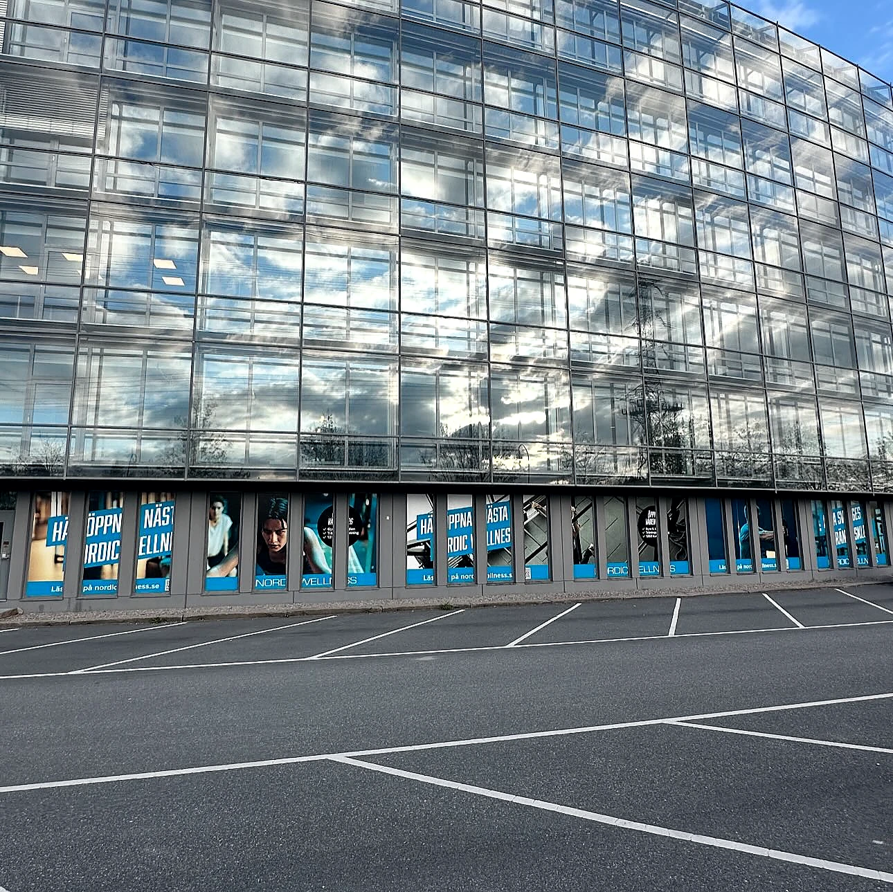 Large office facade with coordinated window graphics